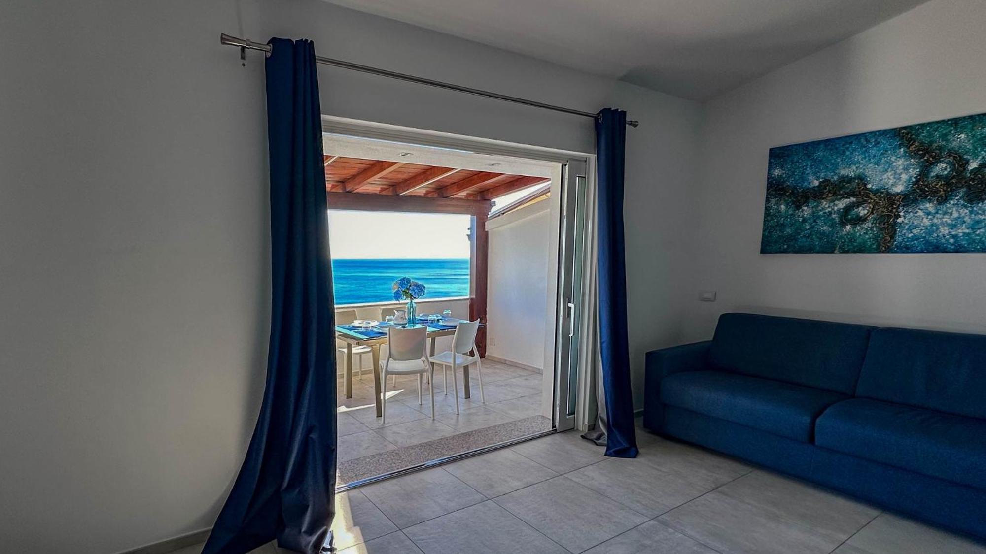 Апартаменты Mama House Con Vista Mare Кала-Гононе Экстерьер фото