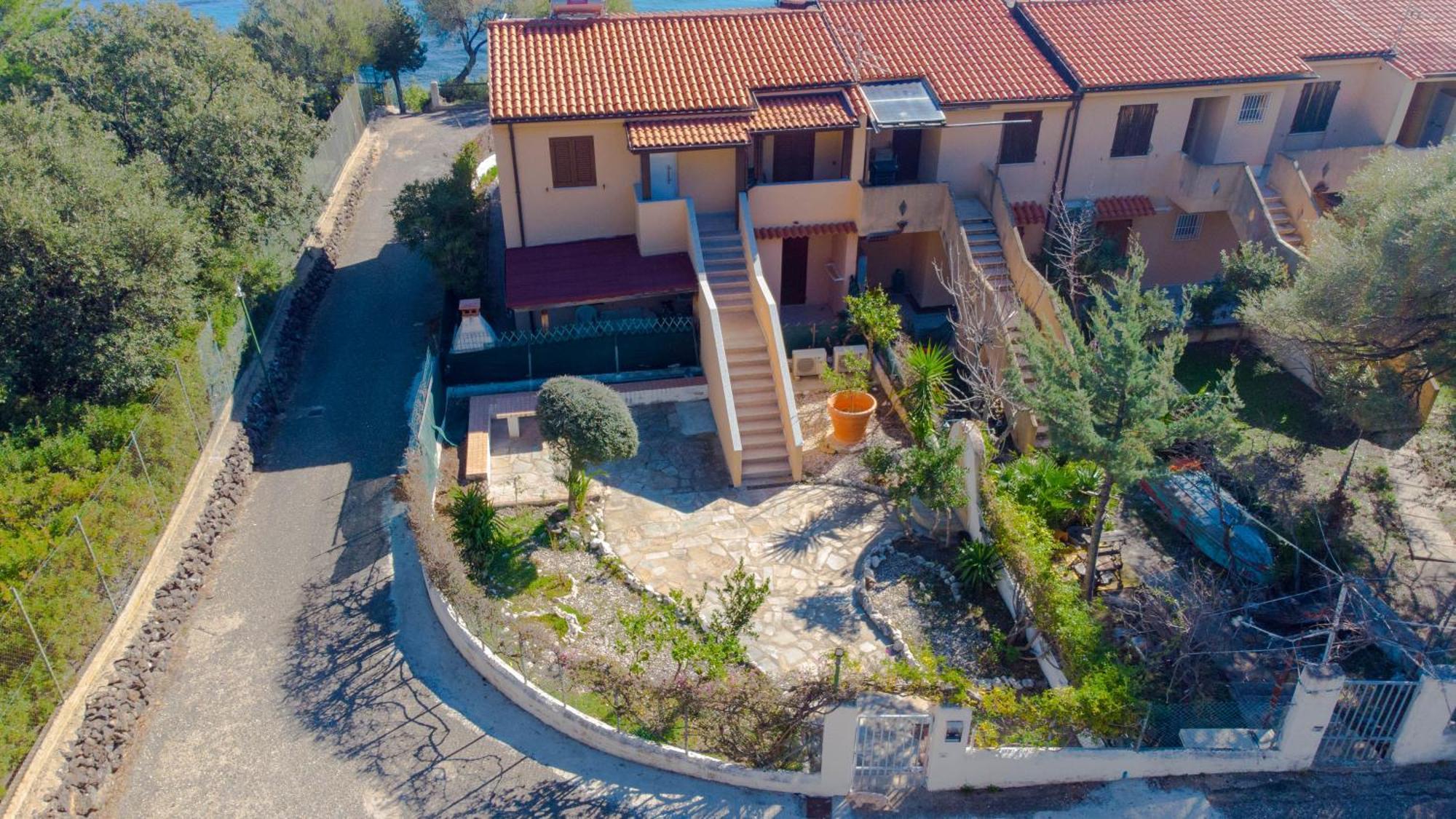 Апартаменты Mama House Con Vista Mare Кала-Гононе Экстерьер фото